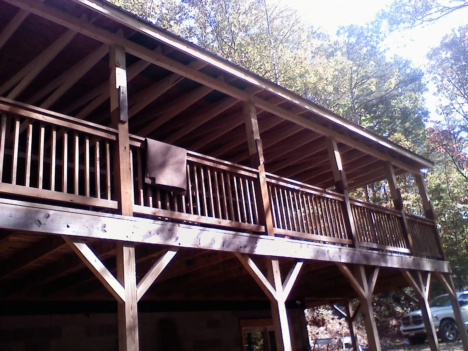 Timber framing under a new elevated porch and deck — Roof Leak Repair in Emporia by Roofing Brothers